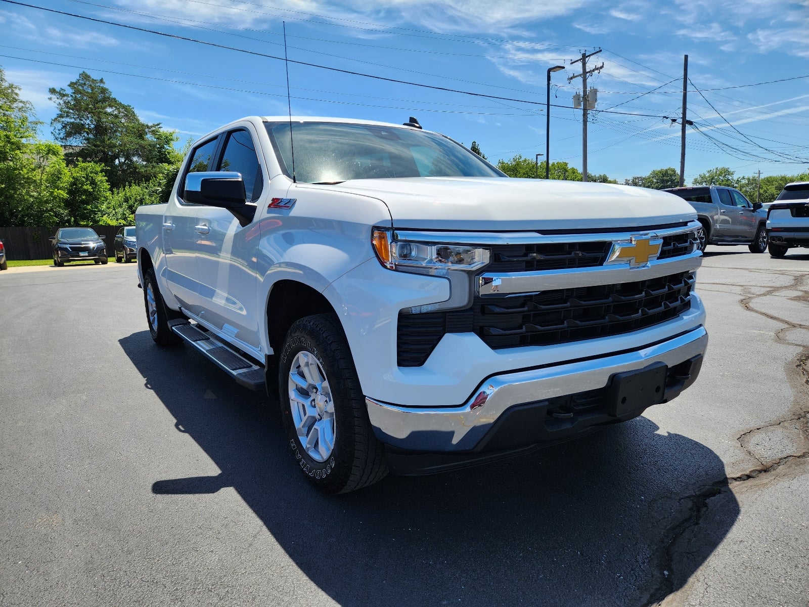 2023 Chevrolet Silverado 1500 LT in Summit White — front three-quarter view