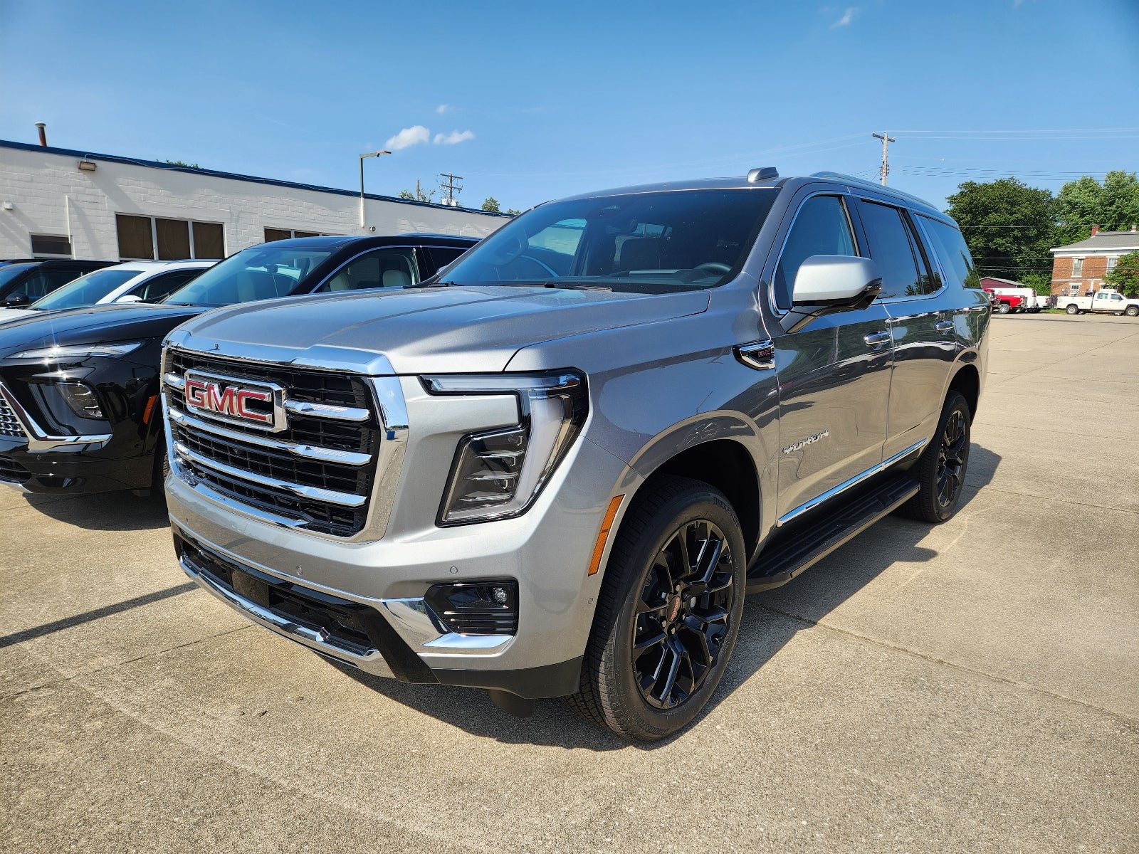2026 GMC Yukon Elevation in Sterling Metallic — front three-quarter view
