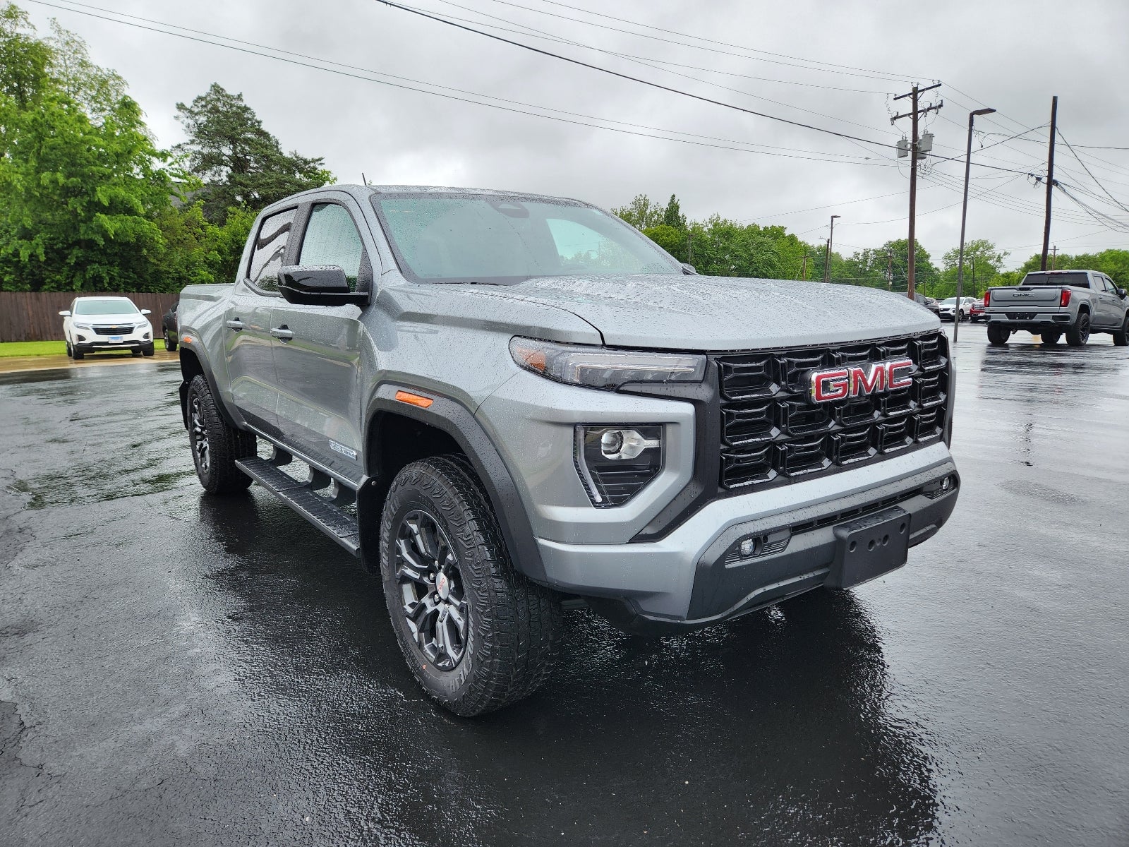 2024 GMC Canyon Elevation in Sterling Metallic — front three-quarter view