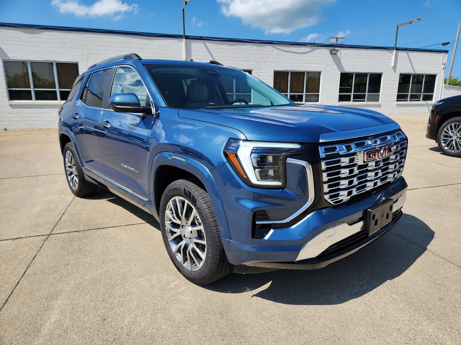2027 GMC Terrain AWD Denali in Downpour Metallic — front three-quarter view