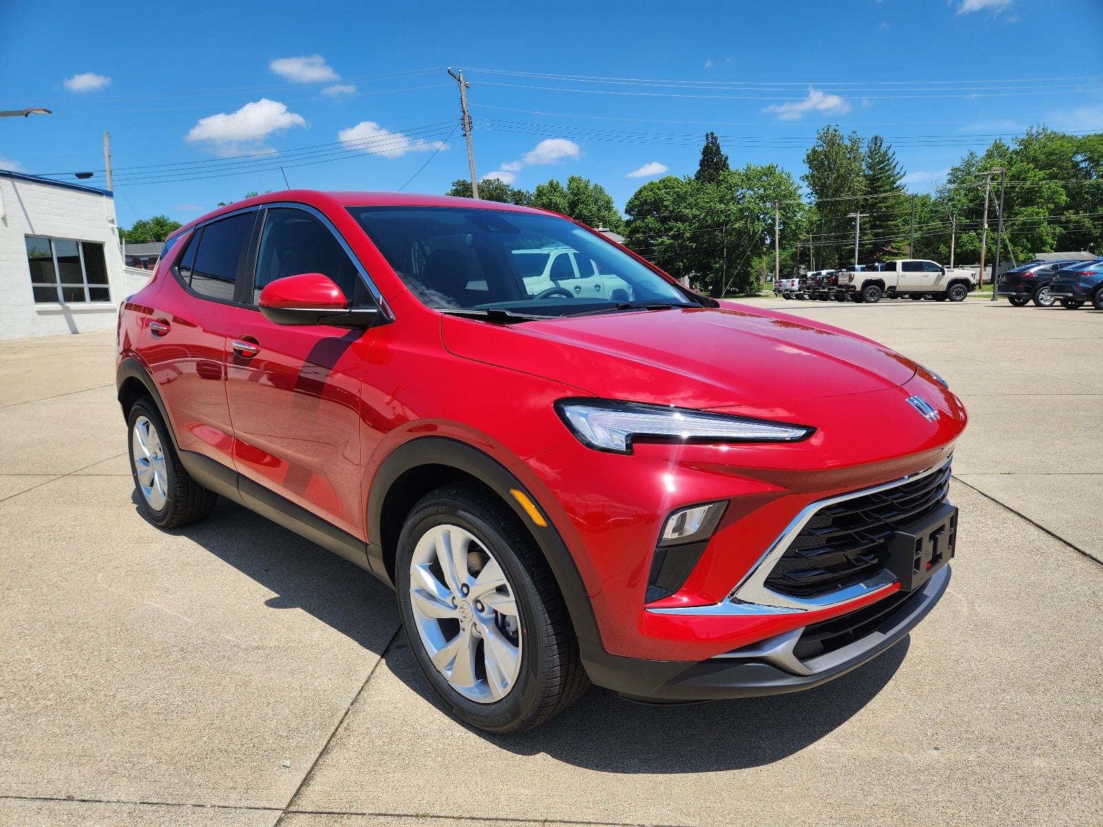 2026 Buick Encore GX Preferred in Brilliant Red — front three-quarter view