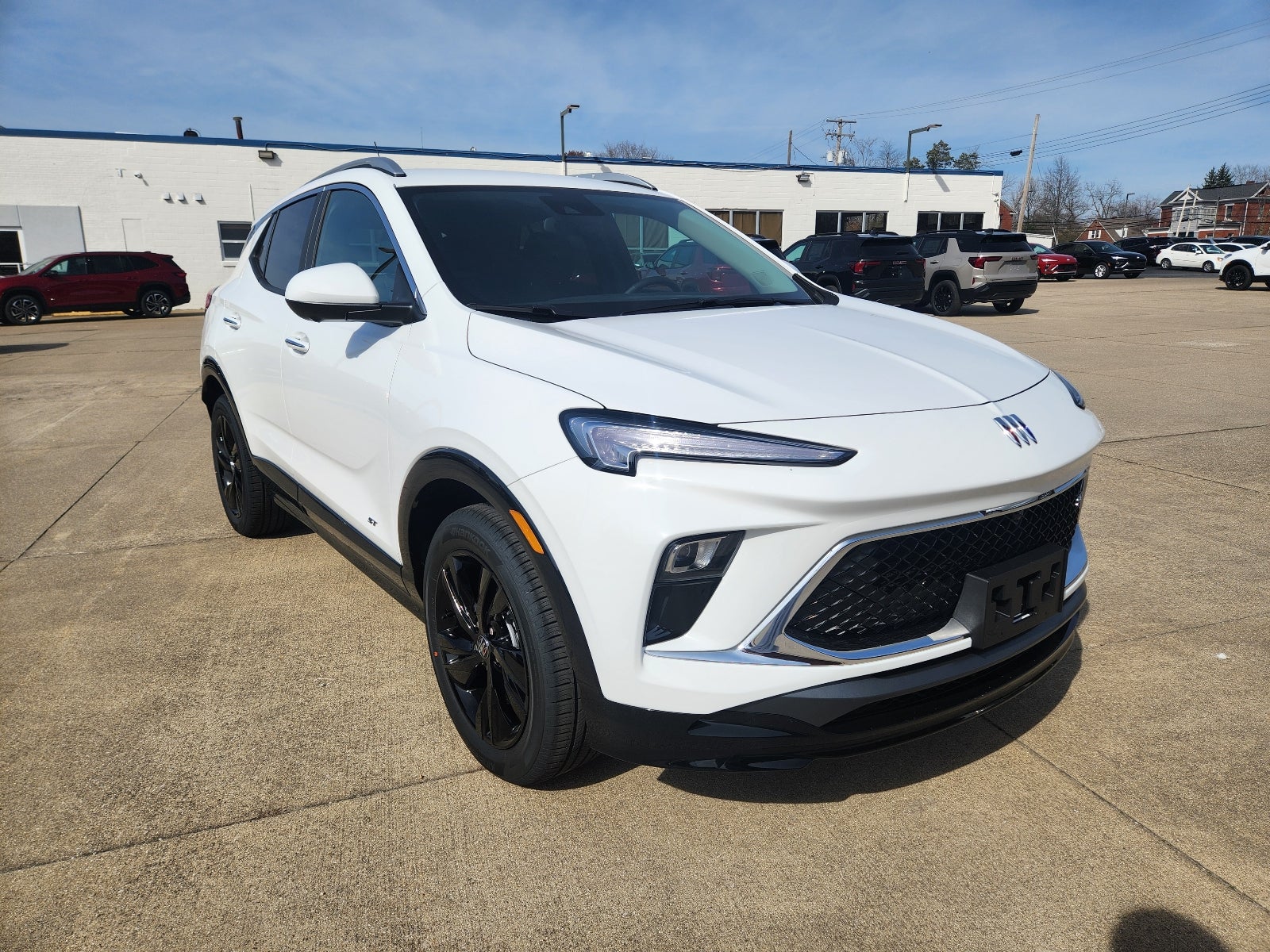 2026 Buick Encore GX Sport Touring in Summit White — front three-quarter view
