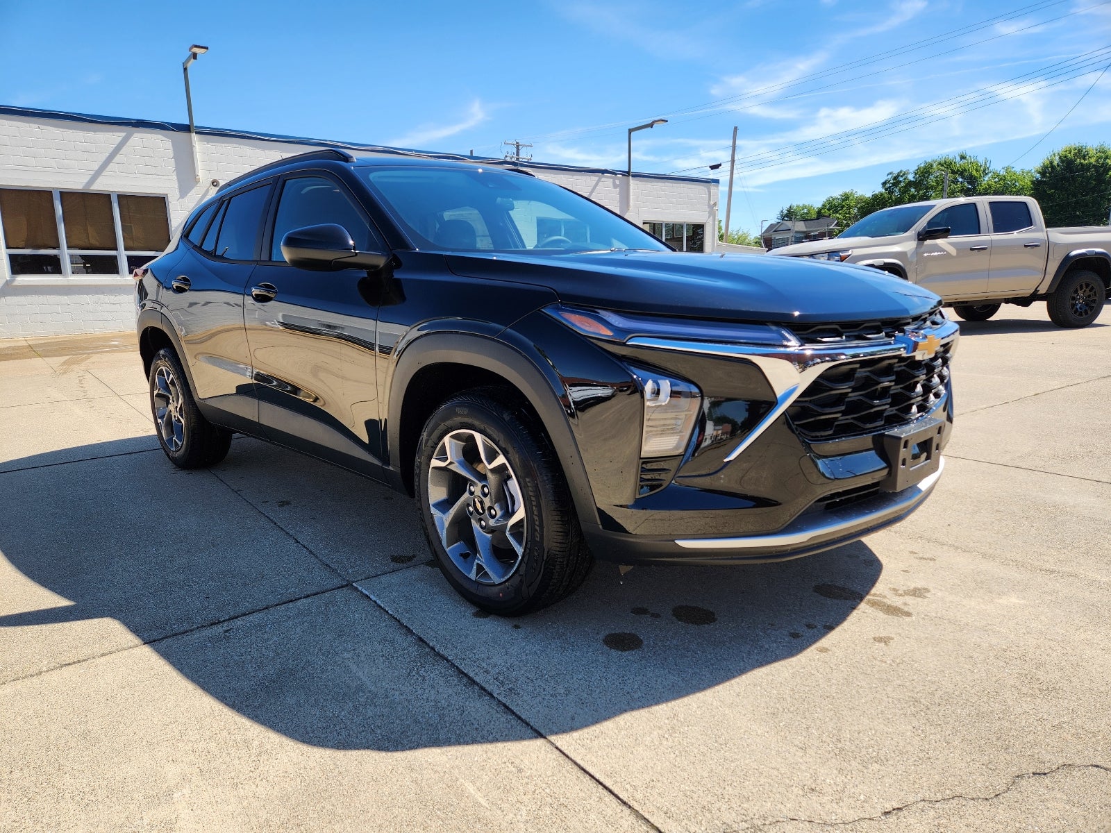 2026 Chevrolet Trax LT in Mosaic Black Metallic — front three-quarter view